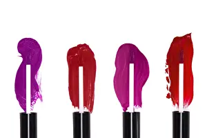 Liquid Lipstick Prints: Liquid lipstick isolate on a white background