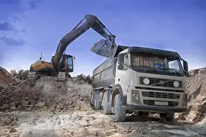 Uninhabited Construction Area Prints: Loading a large lorry building material