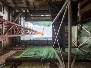Building Renovation Prints: Looking up inside a building under construction