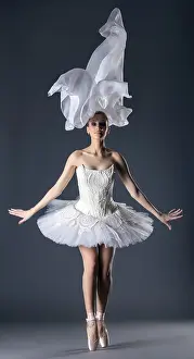Young Ballet Dancer Prints: Lovely young ballet dancer posing in studio