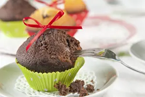 Sweet Treats On Display Prints: Lovingly decorated muffins on a coffee table