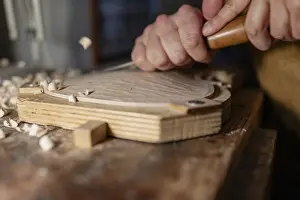 Traditional Craftsman Prints: Luthier using gouge and mallet