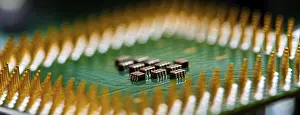 Macro Electronic Components Prints: Macro Close up of microchips and pins on Main CPU PC processor circuit board