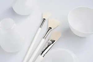 High Angle Shot Prints: Make up brushes of different size and type object high angle shot on white surface