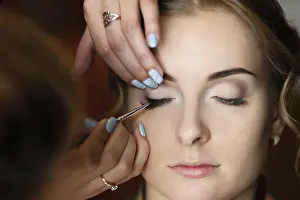 Glamour Makeup Prints: Make-up artist doing makeup.Make up