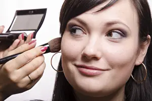 Female Makeup Artist Prints: Makeup artist in the process of makeup