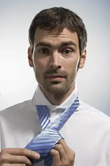 European Ethnicity Prints: Man doing up his tie