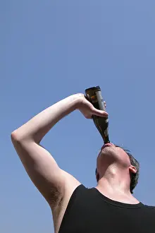 Man Drinking Beer Prints: Man drinking beer
