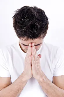 Portrait Of A Believer Prints: Man folding his hands