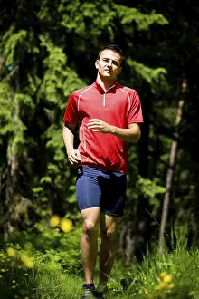 Fitness In Nature Prints: Man jogging in forest