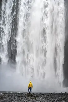 Icelandic Waterfall Scenery Prints: Man in front of large waterfall