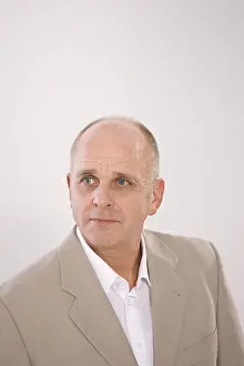 Pensive Portrait Photo Prints: A man looking sideways