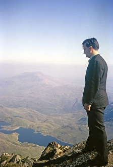 Vintage Wales Photography Prints: Man looking at the view from the summit of Mount Snowdon