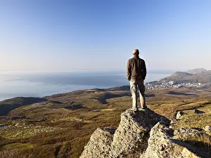 Rocky Cliff Landscape Prints: Man on the top of the mountain