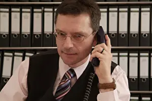 Man On Phone Prints: Man in the office