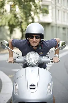 Safety Helmet Images Prints: Man on scooter