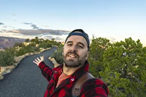 Sunset Landscape Photography Prints: Man smiling at the camera
