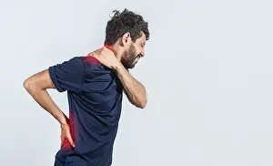 Healthcare Concept Prints: Man with spine and shoulder problems