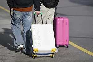 Holiday Tourism Photography Prints: Man with suitcase