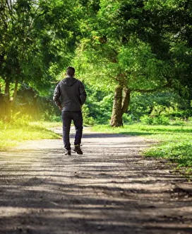 Latin American Ethnicity Portrait Prints: Man walking down a desolate road