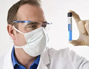 Laboratory Researcher Prints: Man working on an experiment in a laboratory