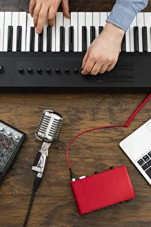 Professional Recording Studio Prints: Man working in home record studio. View from above