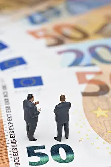 Business Finance Concept Prints: Manager, miniature figures on banknotes
