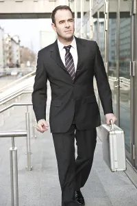 Chief Executive Officer Image Prints: Manager passing an office building