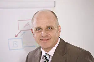 Businessman Suit Prints: Manager standing in front of a flip chart