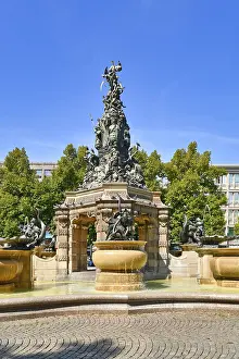 Prints of Mannheim, Germany, September 2022: Fountain with sculptures called Grupello Pyramid with sculptures in square called Paradeplatz in city center Mannheim, Germany Mannheim Prints: Mannheim, Germany: Grupello Pyramid Fountain Print