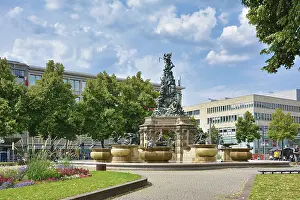 Prints of Mannheim, Germany, August 2019: Fountain called Grupello Pyramid with sculptures in small park at square called Paradeplatz in city center of Mannheim on a sunny day Mannheim, Germany Mannheim Prints: Mannheim, Germany Print: Grupello Pyramid Fountain