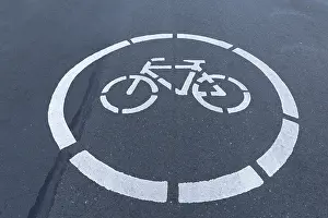 Prints of Marked bicycle path on the road, Munster, Germany Marked bicycle path on the road, Mnster, Germany Munster Prints: Marked Bicycle Path Print, Münster Germany