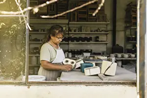 Pottery Making Process Prints: Master potter working in her studio