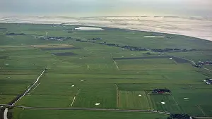 UNESCO World Natural Heritage Site Aerials Prints: Meadows and fields with a single wind turbine