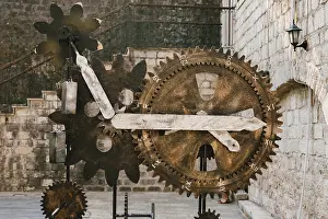 Prints of Mechanism of the clock from gears in the old city of Kotor in Montenegro Montenegro Prints: Mechanism of the clock from gears in Kotor, Montenegro Print