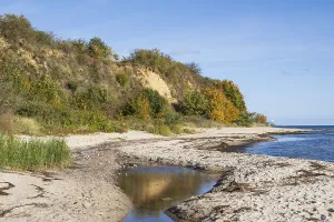 Steep Cliff Line Germany Prints: Beach and cliff with reflection