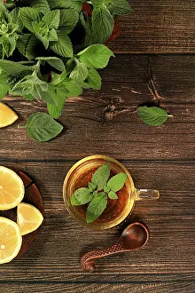 Alternative Medicine Prints: Print of Medicinal Peppermint Tea with Lemon and Flowers