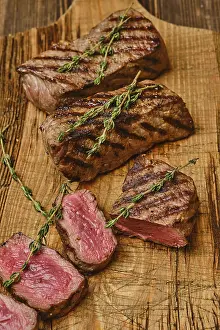Barbecued Meat Dish Prints: Medium rare roasted beef steak