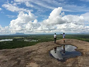 One Person In Nature Prints: Men standing on rocks, reflection in a puddle