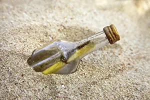 Deserted Beach Landscape Prints: Message in the bottle on sand beach