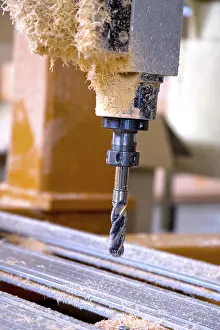 Industrial Building Prints: Metal drill in plastic garbage