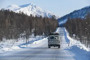 Road Of Bones Russia Prints: Minivan driving on the Road of Bones