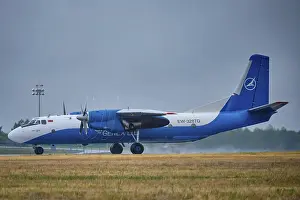 Prints of MINSK, BELARUS, JUNE 15, 2018: Genex cargo flight Antonov An-26B plane preparing to take-off on runway in National Airport Minsk Aviation Prints: MINSK, BELARUS: Antonov An-26B Print