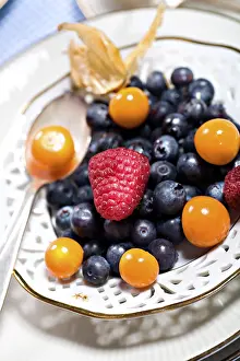 Studio Shot Of Berries Prints: Mixed berries on a plate
