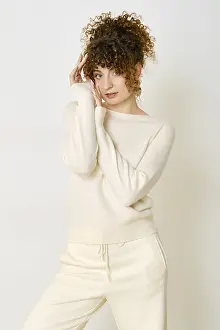 Curly Haired Beauty Prints: A model stands with a playful expression