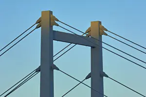 Evening Light Atmosphere Photos Prints: A modern bridge at sunset with clear cable structures and a cloudless sky