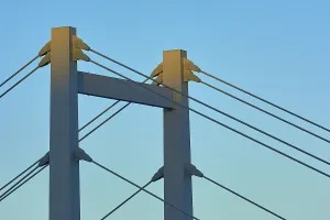 German Federal Republic Bridges Prints: A modern bridge at sunset with clear cable structures and a cloudless sky
