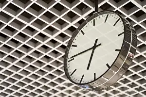 Black And White Architecture Prints: Modern clock with dial on structured wall background in black and white with chrome