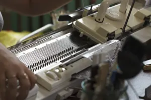 Textile Manufacturing Process Prints: Modern machine for knitting on weaving mill