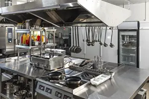 Commercial Kitchen Setup Prints: Modern shiny kitchen with stainless still kitchenware